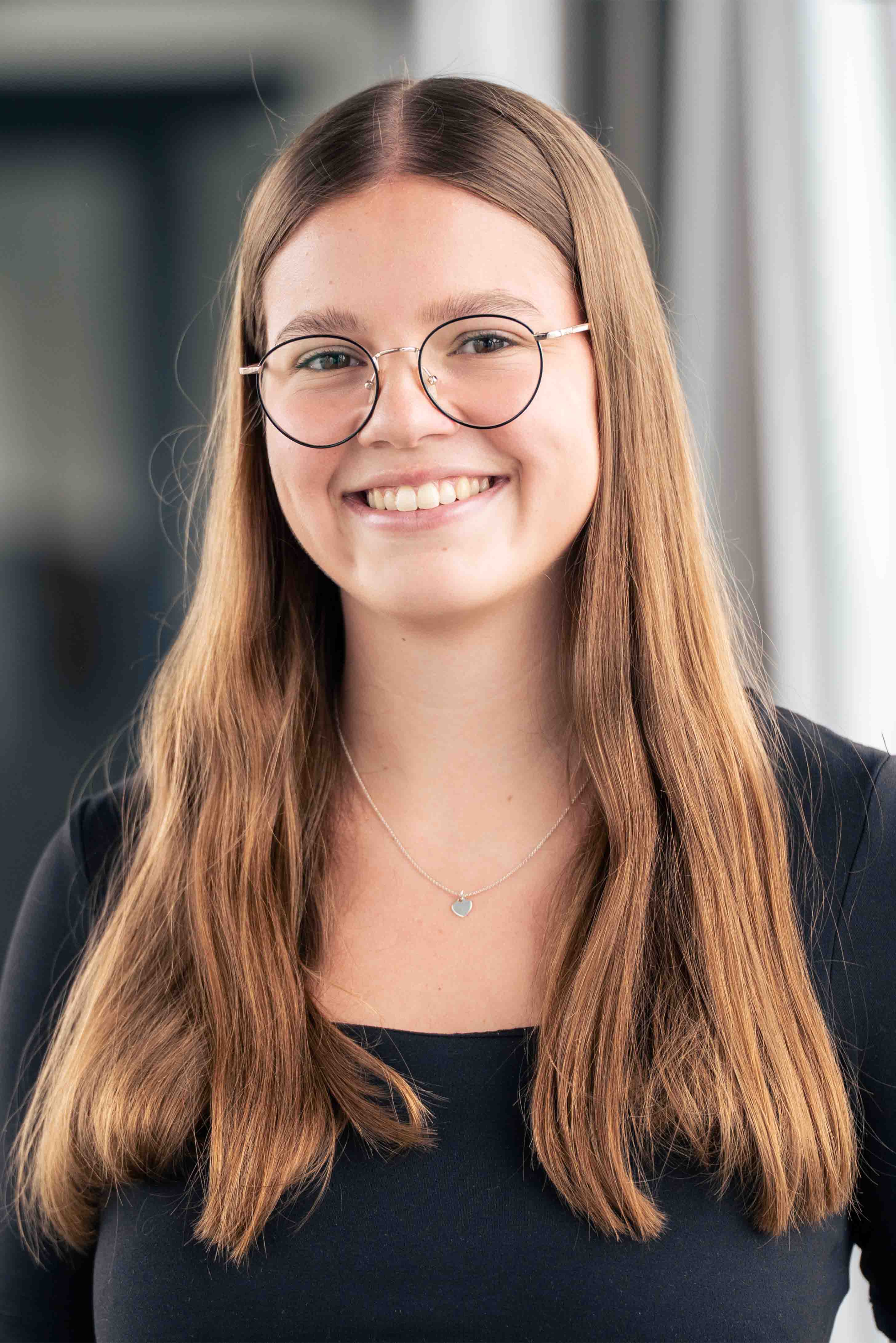glasses, round glasses, long hair, necklace, black top